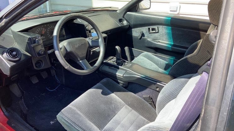 1987 Toyota MR2 interior showing great condition of the grey cloth seats and interior