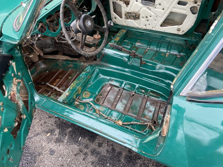1972 Triumph GT6 MK3 for restoration, interior with door open, showing the minimal rust and solid floors