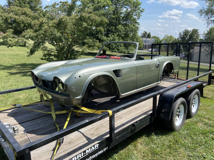 1965 Triumph TR4A body as arrived from body shop painted in Aston Martin Sage Green