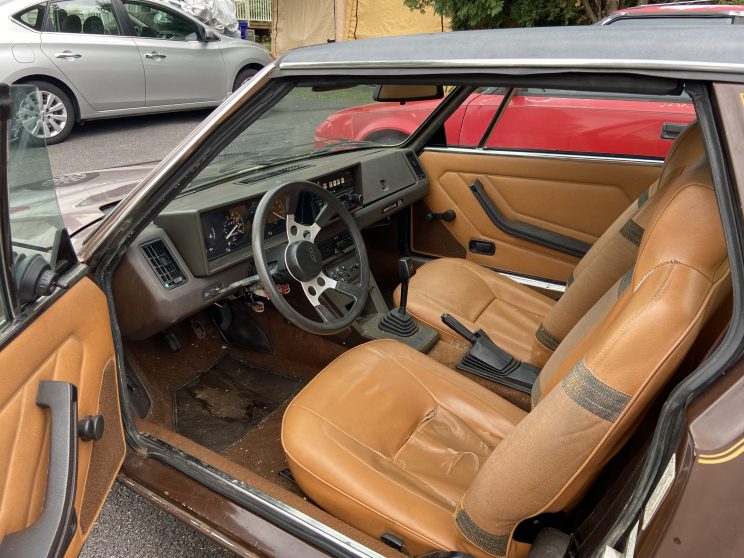 1980 Fiat X1/9 interior showing tan seats and brown accents