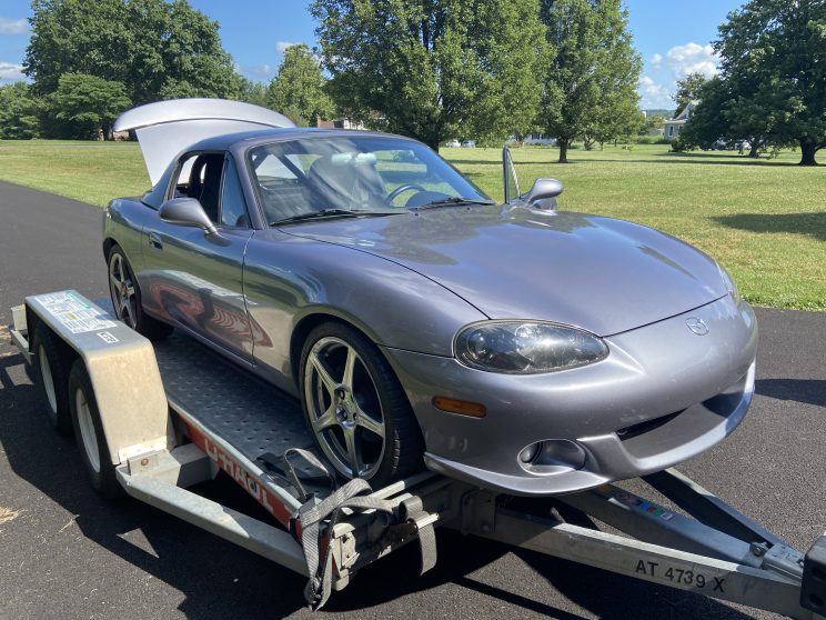 2004 Mazdaspeed Miata race car on trailer as delivered